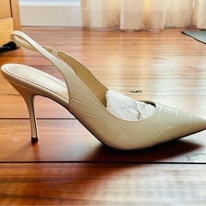 Marc Fisher, size 8.5  ivory leather sling back pumps.  Like new, worn 1-2 times